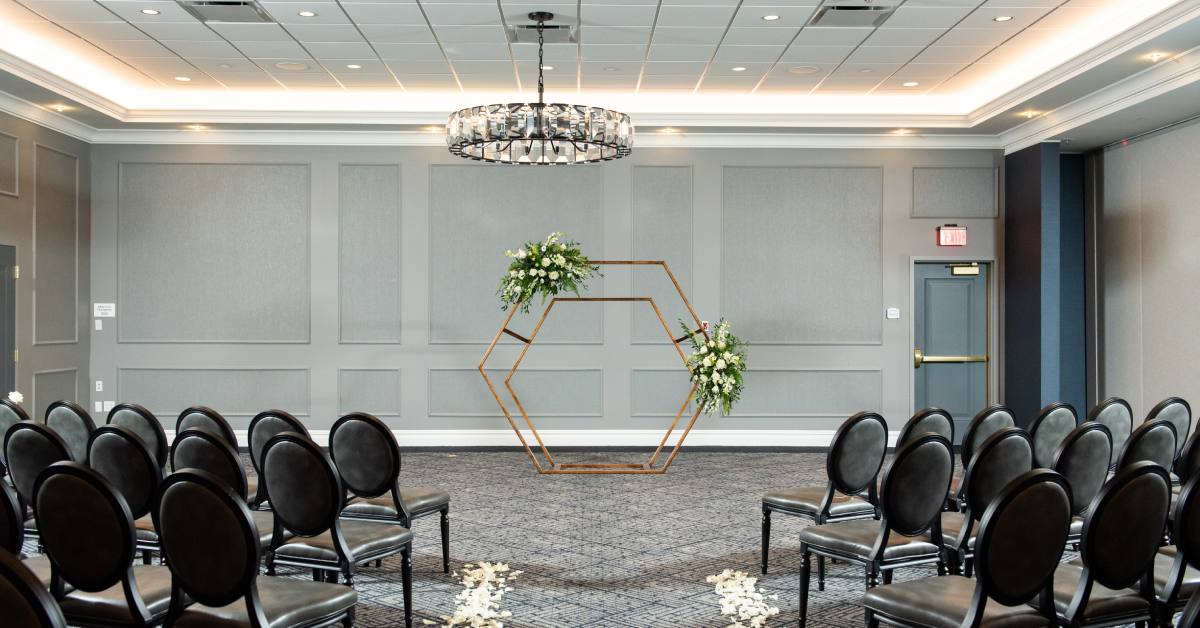 ballroom set up for a wedding ceremony